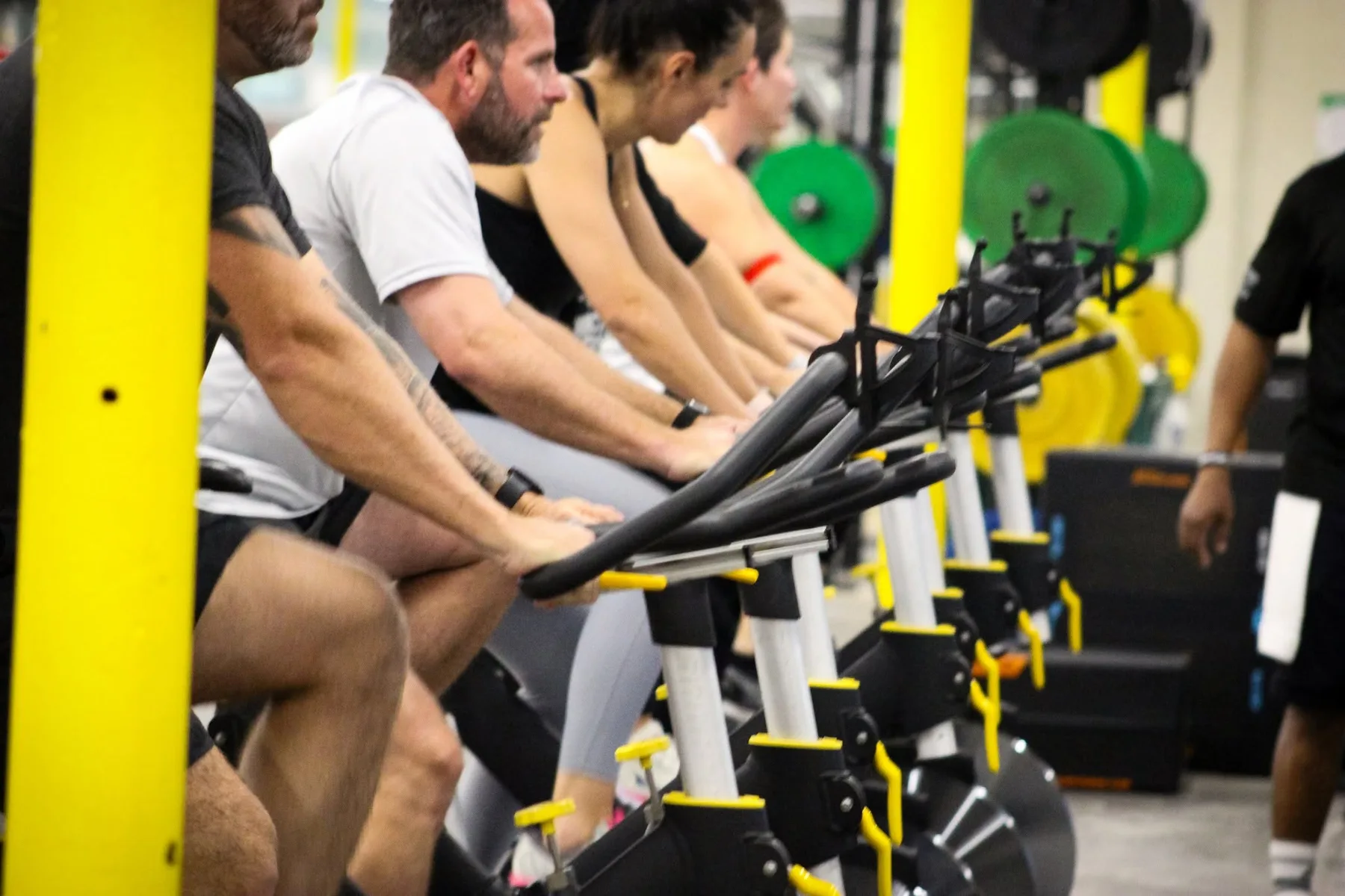 Members riding together in a Downtown Gym spin class